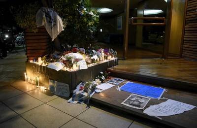 Tributes to  Maradona at the entrance of his former house in Buenos Aires. Getty