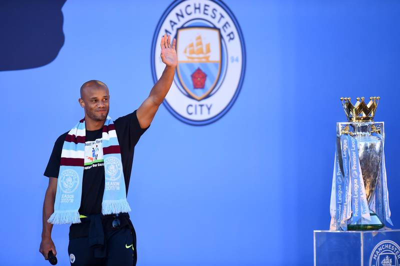 Vincent Kompany of Manchester City acknowledges fans during the Manchester City Teams Celebration Parade in Manchester, England. Getty Images