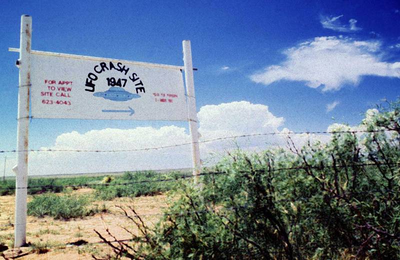 A sign off route U.S. 285, north of Roswell, New Mexico, points west to the alleged 1947 crash site of a flying saucer on the Corn Ranch. Visitors can tour the site for $15 and camp out at the site for $90 during the upcoming festival in July marking the 50th anniversary of the so called "Roswell Incident."  The Air Force denies claims of an alien UFO crash, saying in a new report issued June 24 that comprehensive examination of the incident found no evidence of flying saucers, space aliens or sinister government cover-ups. Photo taken June 20 1997.**POOR QUALITY DOCUMENT** - PBEAHUMMWDF