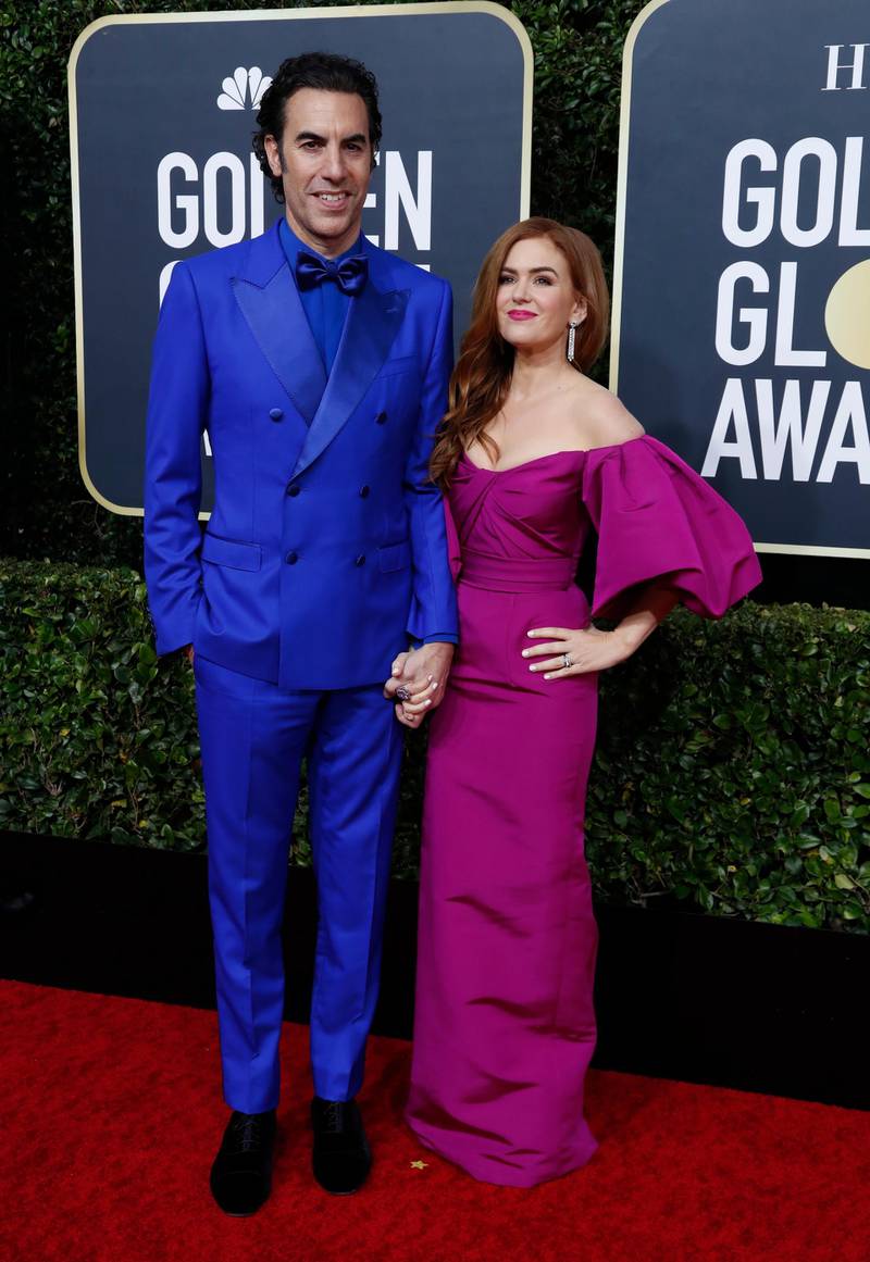 Sacha Baron Cohen, wearing Dolce & Gabbana, and Isla Fisher arrive at the 77th annual Golden Globe Awards at the Beverly Hilton Hotel on January 5, 2020. Reuters