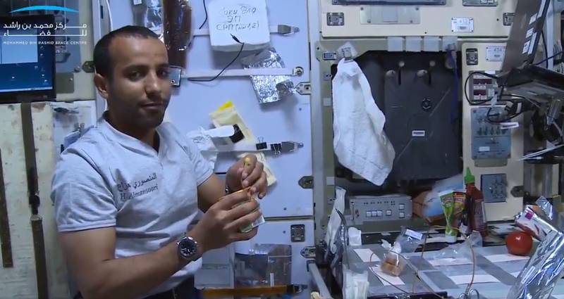 Hazza Al Mansouri having breakfast aboard the International Space Station. The UAE's first astronaut received the Nasa Distinguished Public Service Medal in recognition of his service. Courtesy: Mohammed bin Rashid Space Centre