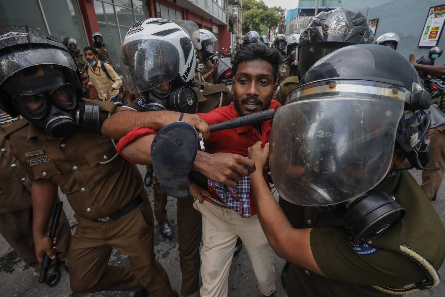 Police detain student protesters during an anti-government demonstration in Colombo last week. EPA