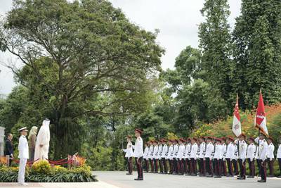 SINGAPORE, SINGAPORE - February 28, 2019: HH Sheikh Mohamed bin Zayed Al Nahyan, Crown Prince of Abu Dhabi and Deputy Supreme Commander of the UAE Armed Forces (4th L), stands for the national anthem with HE Halimah Yacob, President of Singapore (back 3rd L), during a reception at the Istana presidential palace.
( Ryan Carter / Ministry of Presidential Affairs )