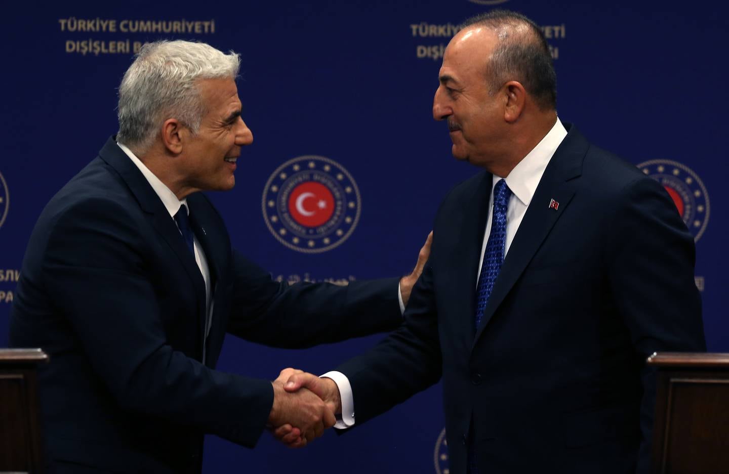 Turkish Foreign Minister Mevlut Cavusoglu, right, and Israeli Foreign Minister Yair Lapid meet in Ankara, Turkey. Mr Lapid was visiting Turkey for talks that were expected to focus on security co-operation. EPA