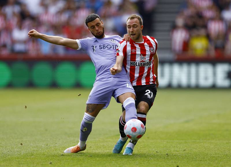 Leeds United's Sam Greenwood battles for the ball with Christian Eriksen if Brentford. Reuters