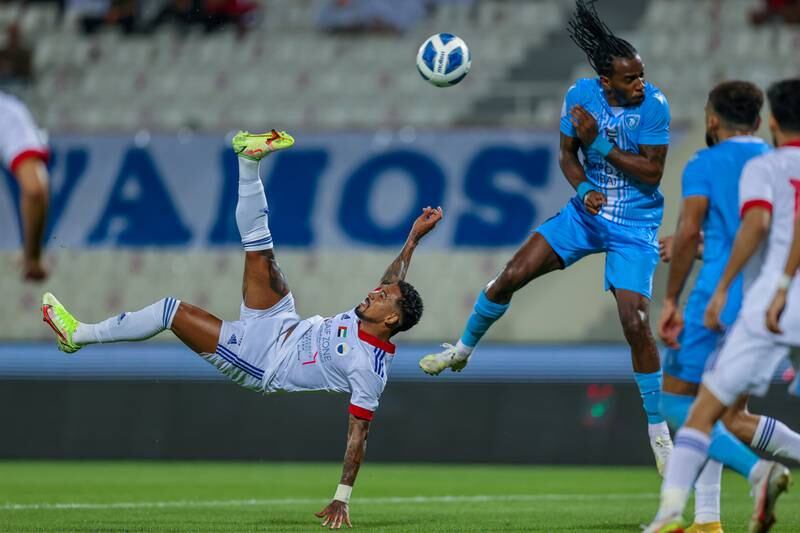 Brazilian Caio Lucas, left, in action for Sharjah FC against Hatta.  A rethink about foreign player quotas is being urged after the UAE’s group-stage exit from the Arabian Gulf Cup. Photo: Sharjah Football Club