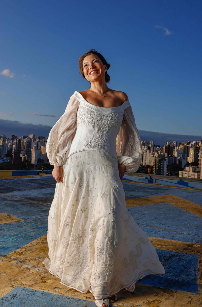 For her wedding to Lula da Silva last year, Janja walked down the aisle in a flowing white dress. AFP