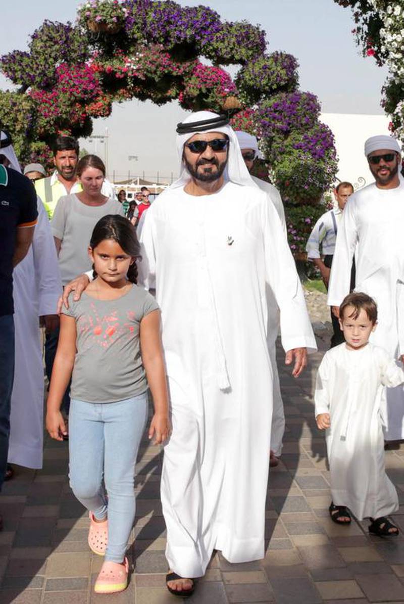 The Ruler of Dubai visits Dubai Miracle Gardens with two of his children.