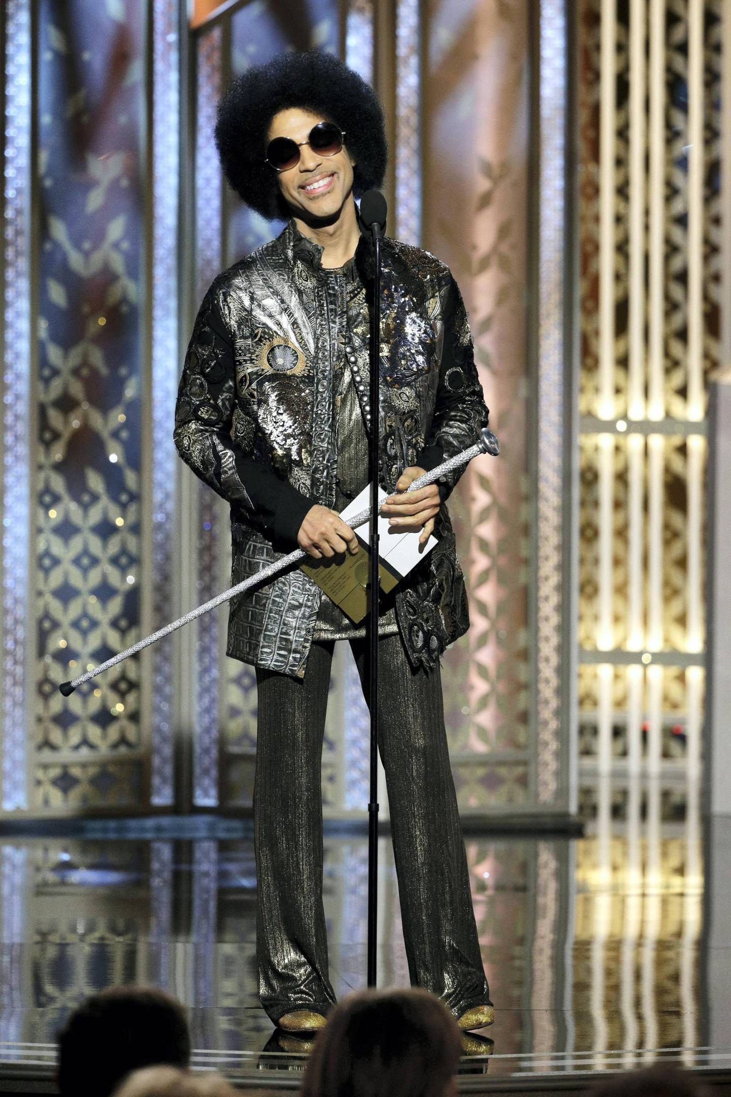 BEVERLY HILLS, CA - JANUARY 11:  In this handout photo provided by NBCUniversal, Presenter  Prince speaks onstage during the 72nd Annual Golden Globe Awards at The Beverly Hilton Hotel on January 11, 2015 in Beverly Hills, California.  (Photo by Paul Drinkwater/NBCUniversal via Getty Images)