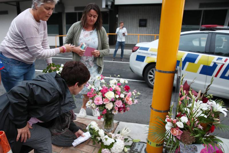 Local residents leave floral tributes at Deans Avenue near the Al Noor mosque in Christchurch, New Zealand. Getty