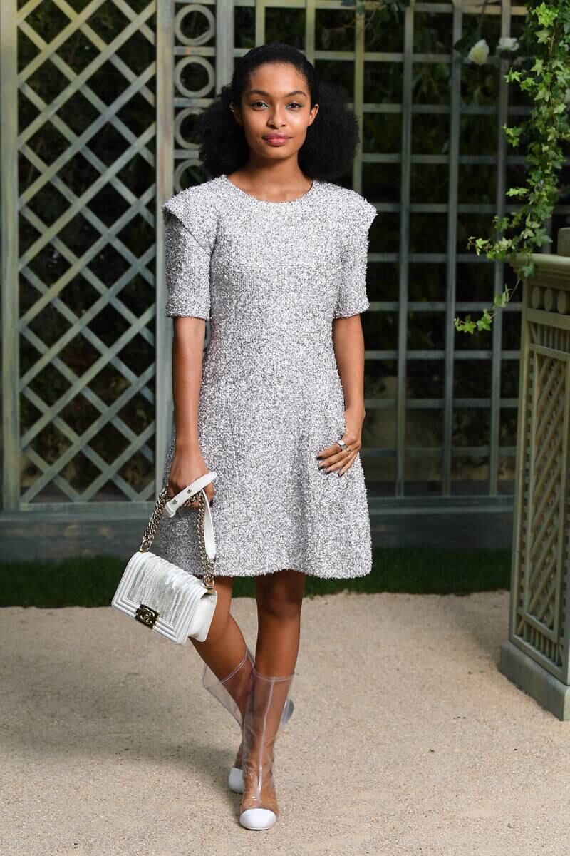 Yara Shahidi, in metallic Chanel, attends the brand's haute couture spring/summer 2018 show during Paris Fashion Week on January 23, 2018. Getty Images