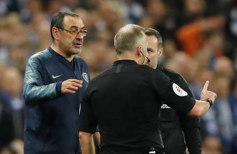Soccer Football - Carabao Cup Final - Manchester City v Chelsea - Wembley Stadium, London, Britain - February 24, 2019  Chelsea manager Maurizio Sarri protests with referee Jonathan Moss after he called Kepa Arrizabalaga to be substituted     Action Images via Reuters/Carl Recine  EDITORIAL USE ONLY. No use with unauthorized audio, video, data, fixture lists, club/league logos or "live" services. Online in-match use limited to 75 images, no video emulation. No use in betting, games or single club/league/player publications.  Please contact your account representative for further details.