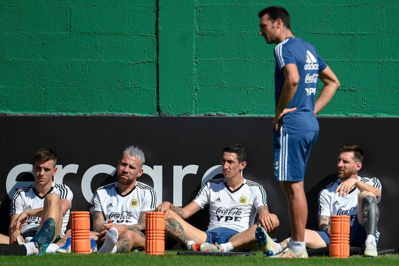 From left: Paulo Dybala, Nicolas Otamendi, Angel Di Maria, Lionel Scaloni and Lionel Messi gather during a training session in Rio de Janeiro. AFP