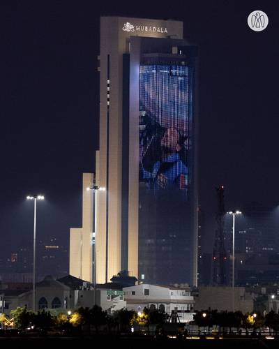 The Mubadala building in Abu Dhabi is lit up to mark Sultan Al Neyadi's return to Earth from the International Space Station. Photo: Abu Dhabi Media Office