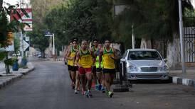 Young Egyptian race walkers address societal ills from dirty streets to dirty looks