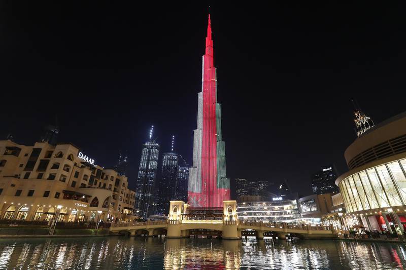 DUBAI, UNITED ARAB EMIRATES , November 18 – 2020 :- Omani flag displayed on the Burj Khalifa in Dubai for Oman’s 50th National Day. (Pawan Singh / The National) For News/Standalone/Big Picture/Online/Instagram