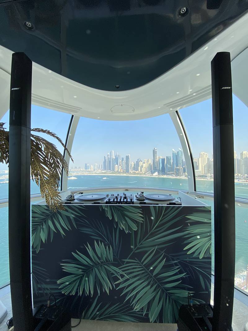 A DJ booth is seen in one of the Ain Dubai capsule pods. Photo: Thoraya Abdullahi / The National