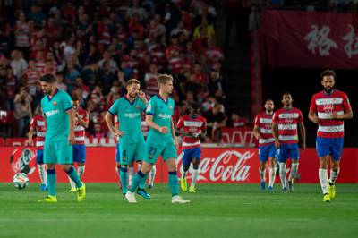 Barcelona players react to Granada's Nigerian midfielder Ramon Azeez's goal after only two minutes. AFP