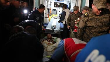 Medics transfer an injured Palestinian to hospital in Tunisia. EPA
