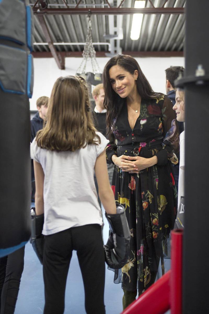 Meghan, Duchess of Sussex, wears Oscar de la Renta to visit boxing charity Empire Fighting Chance on February 1, 2019 in Bristol, England. Getty