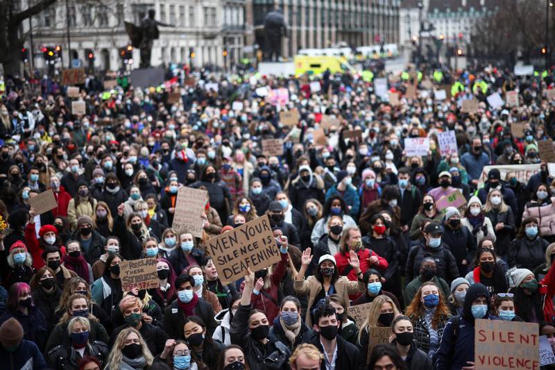 People attend a protest at the Parliament Square, following the kidnap and murder of Sarah Everard, in London, Britain March 14, 2021. REUTERS/Henry Nicholls