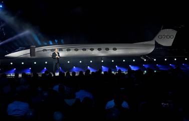 Gulfstream Aerospace's president Mark Burns speaks during the unveiling of the company's new G700 business jet at an industry conference in Las Vegas. Reuters. 
