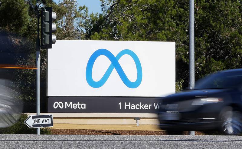 A car passes the Meta logo on a sign at the company's headquarters in Menlo Park, California. AP