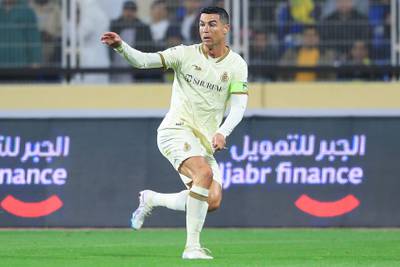 Cristiano Ronaldo passes in the match between Al Fateh and Al Nassr. AFP