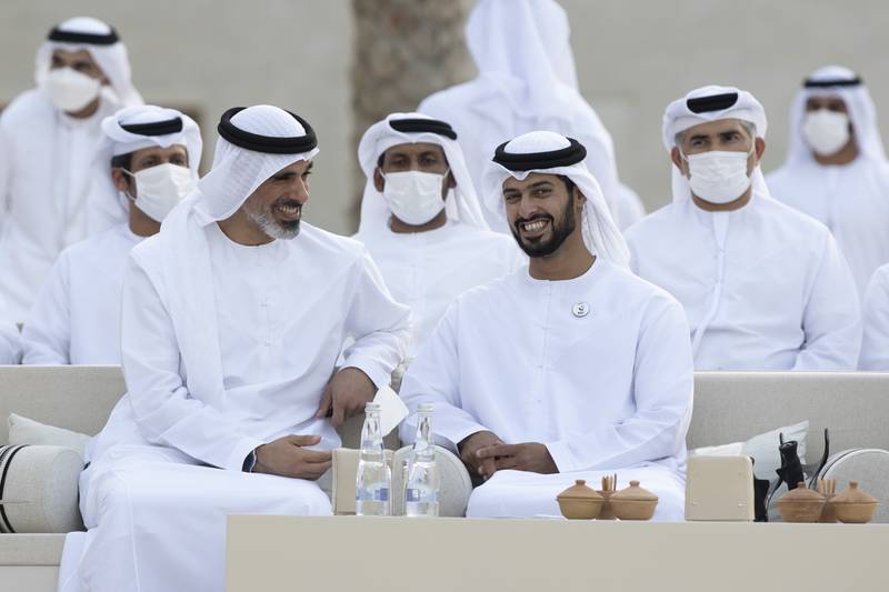 Sheikh Khaled bin Mohamed bin Zayed, member of the Abu Dhabi Executive Council and chairman of the Abu Dhabi Executive Office (L), and Sheikh Zayed bin Hamdan bin Zayed attend the group wedding.