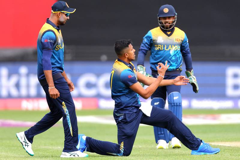 Sri Lanka's Maheesh Theekshana celebrates the wicket of Ireland's Lorcan Tucker. AFP