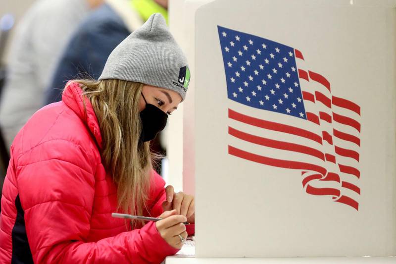 Voters mark their ballots at Bloomfield United Methodist Church in Des Moines, Iowa. AFP