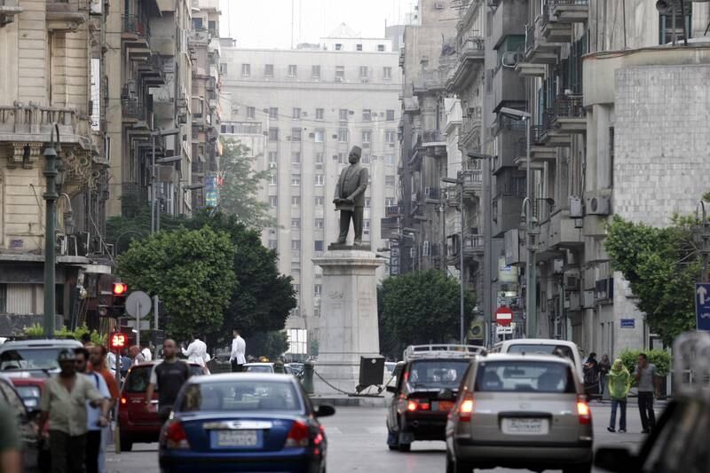 Cars pass through Talaat Harb Square in downtown Cairo, Egypt on Tuesday July 1, 2008. Victoria Hazou/Bloomberg News