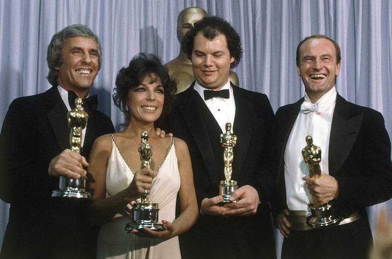 Bacharach, from left, appears with ex-wife Carole Bayer Sager, Christopher Cross and Peter Allen, winners of the Oscar for best original song Arthur's Theme at the 54th Annual Academy Awards in Los Angeles, 1982. AP