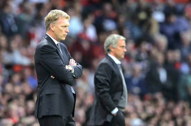 MANCHESTER, ENGLAND - AUGUST 26:  Manchester United Manager David Moyes and Chelsea Manager Jose Mourinho ((R) look on during the Barclays Premier League match between Manchester United and Chelsea at Old Trafford on August 26, 2013 in Manchester, England.  (Photo by Alex Livesey/Getty Images)