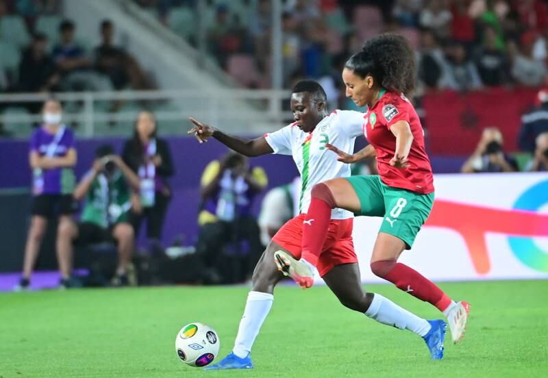 Salma Amani of Morocco, right, in action against Assanato Nako of Burkina Faso.