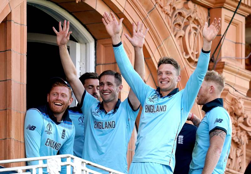 England players celebrate on the balcony at Lord's. PA