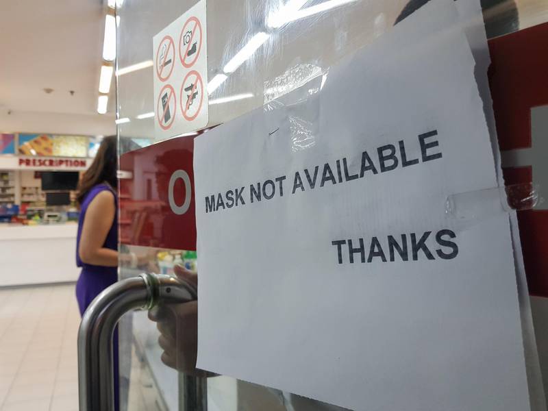 A drug store puts up a sign of masks not available in Makati south of Manila, Philippines. EPA