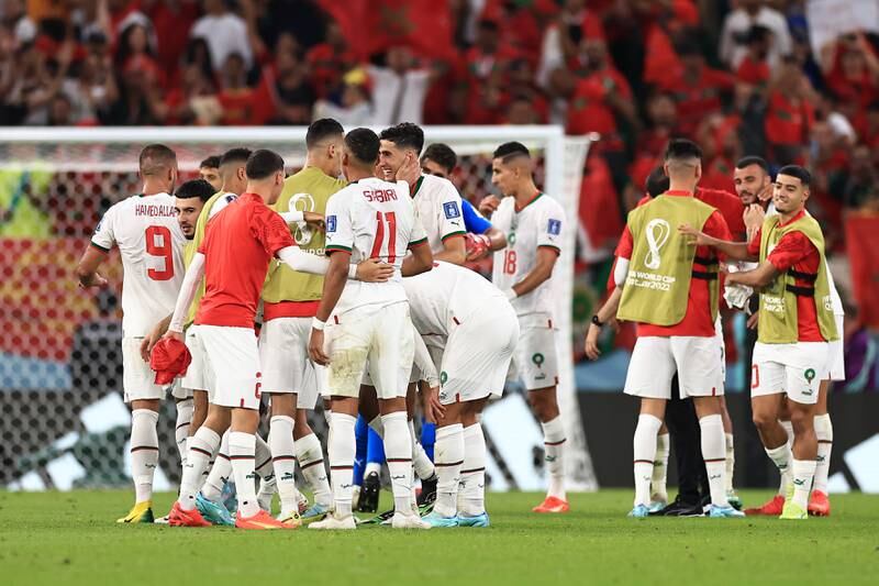 Morocco players celebrate the 2-0 Group F win against Belgium  at Al Thumama Stadium on November 27, 2022 in Doha. Getty
