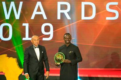 Senegal winger Sadio Mane (L) receives the award for Player of the Year from Ahmad Ahmad, President of the Confederation of African Football. AFP