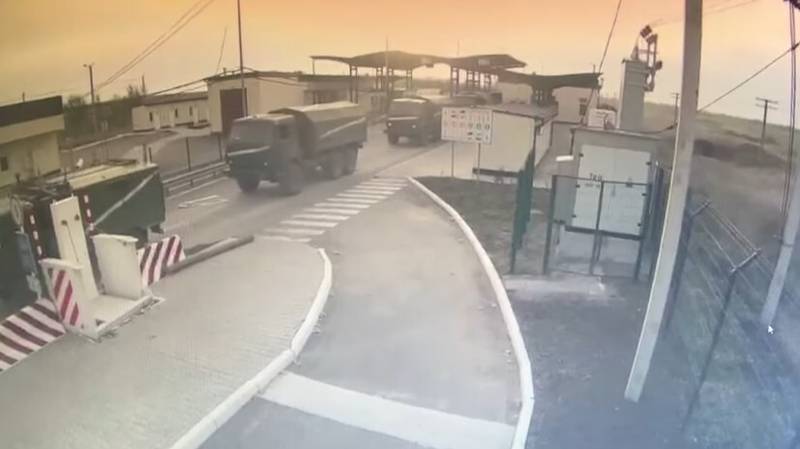 A CCTV image issued by the State Border Guard Service of Ukraine shows Russian military vehicles moving across the border from Crimea into Ukraine, on February 24.