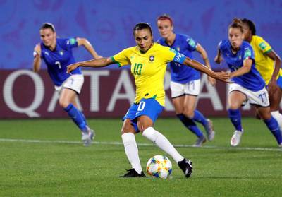 Marta shoots from the penalty spot for Brazil against Italy. Reuters