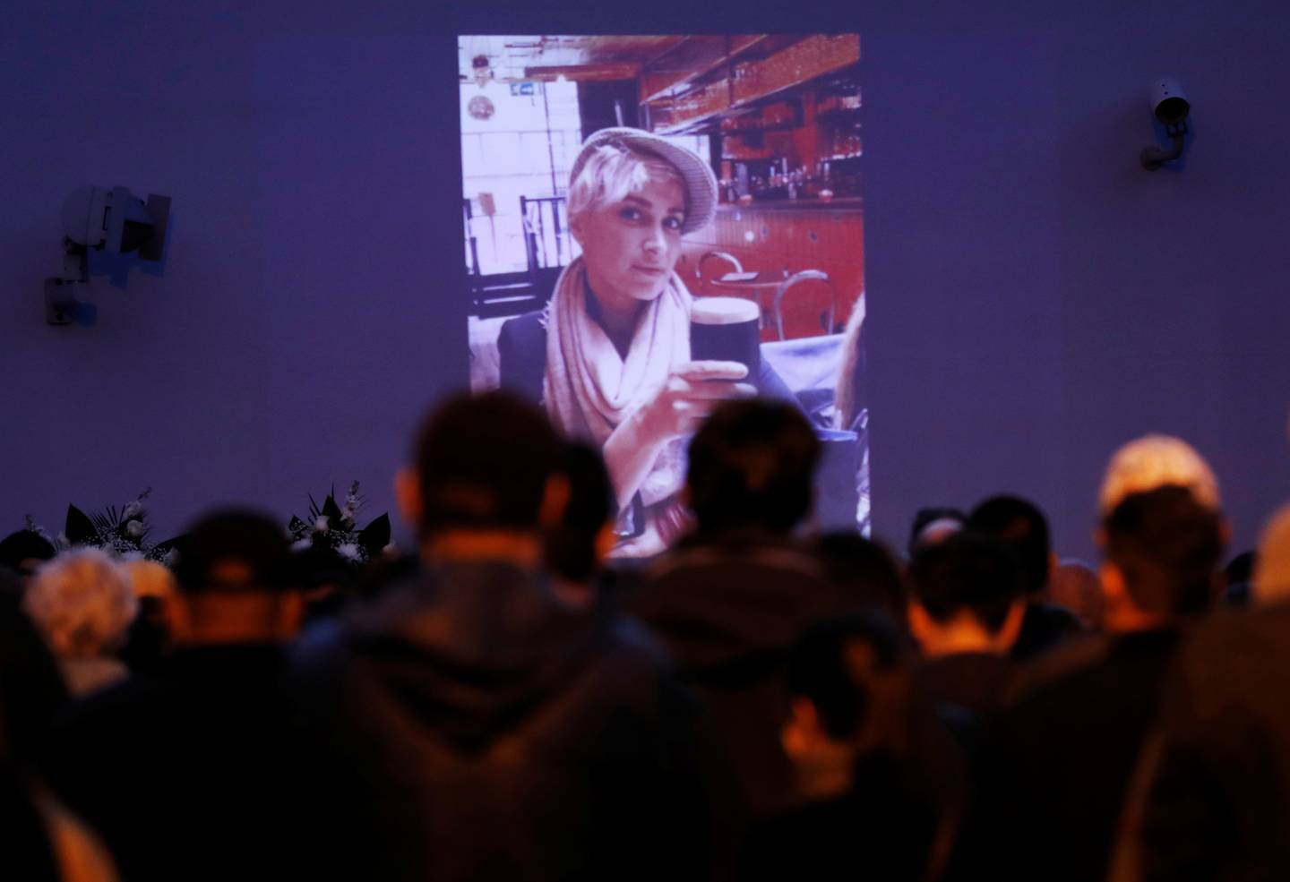 People attend a vigil for late cinematographer Halyna Hutchins in Los Angeles. Reuters
