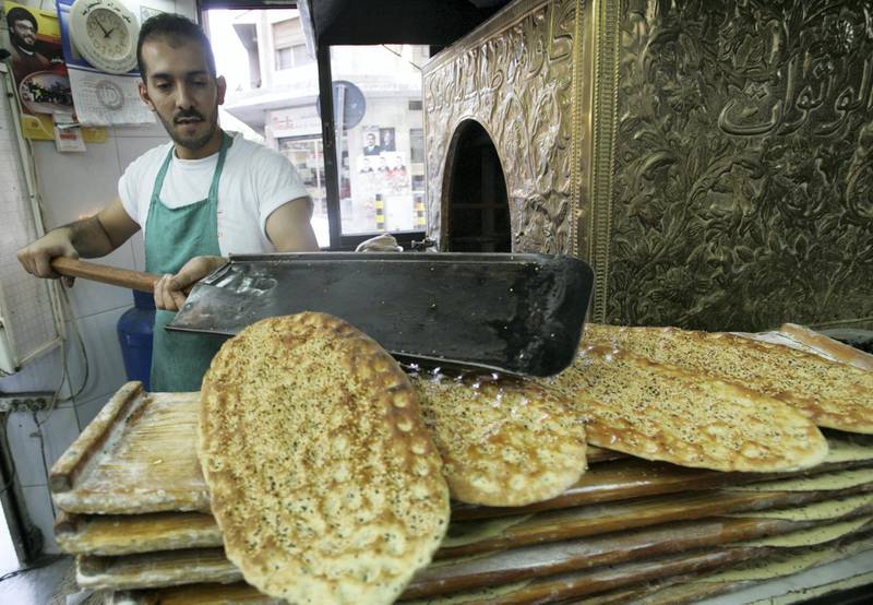 Lebanese baker prepares popular Ramadan 'Mashtah' bread on the third day of the Muslim fasting month in Beirut October 6,2005. Ramadan, one of the five pillars of Islam, is the ninth month of the Muslim Calendar and is also called the Fast of Ramadan and lasts the entire month. REUTERS/Jamal Saidi PP05100118