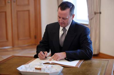 epa06719539 The new US Ambassador to Germany, Richard Allen Grenell signs the guest book prior to his diplomatic accreditation ceremony at Bellevue Palace in Berlin, Germany, 08 May 2018. The position of US Ambassador to Germany was left vacant for more than one year.  EPA/FELIPE TRUEBA