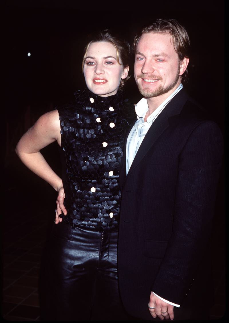 Kate Winslet, in a sequin-encrusted top, and Jim Threapleton attend the premiere of 'Holy Smoke' in Hollywood, California, on January 12, 2000. Getty Images