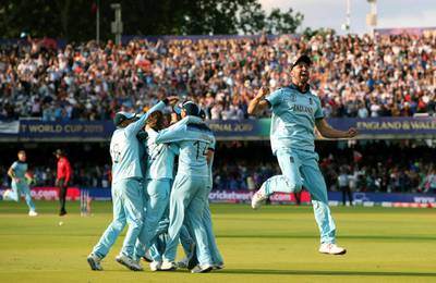 England players celebrate after winning the Cricket World Cup final at Lord's. AP