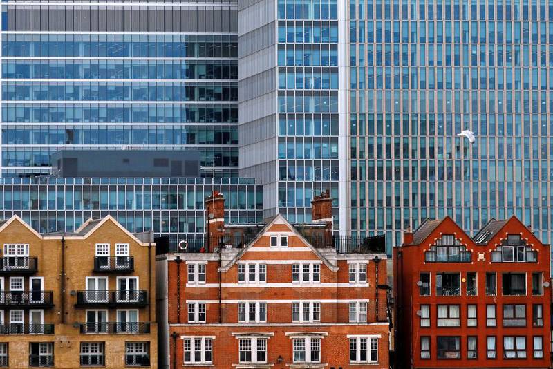 Apartment buildings and commercial towers at Canary Wharf in London. Fears of a Brexit are influencing the UK property market. Reinhard Krause/Reuters