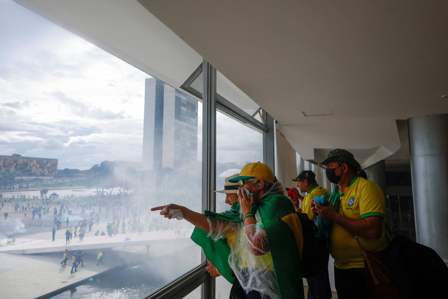 Supporters of Brazil's former president Jair Bolsonaro demonstrate against President Luiz Inacio Lula da Silva, in Brasilia. Reuters