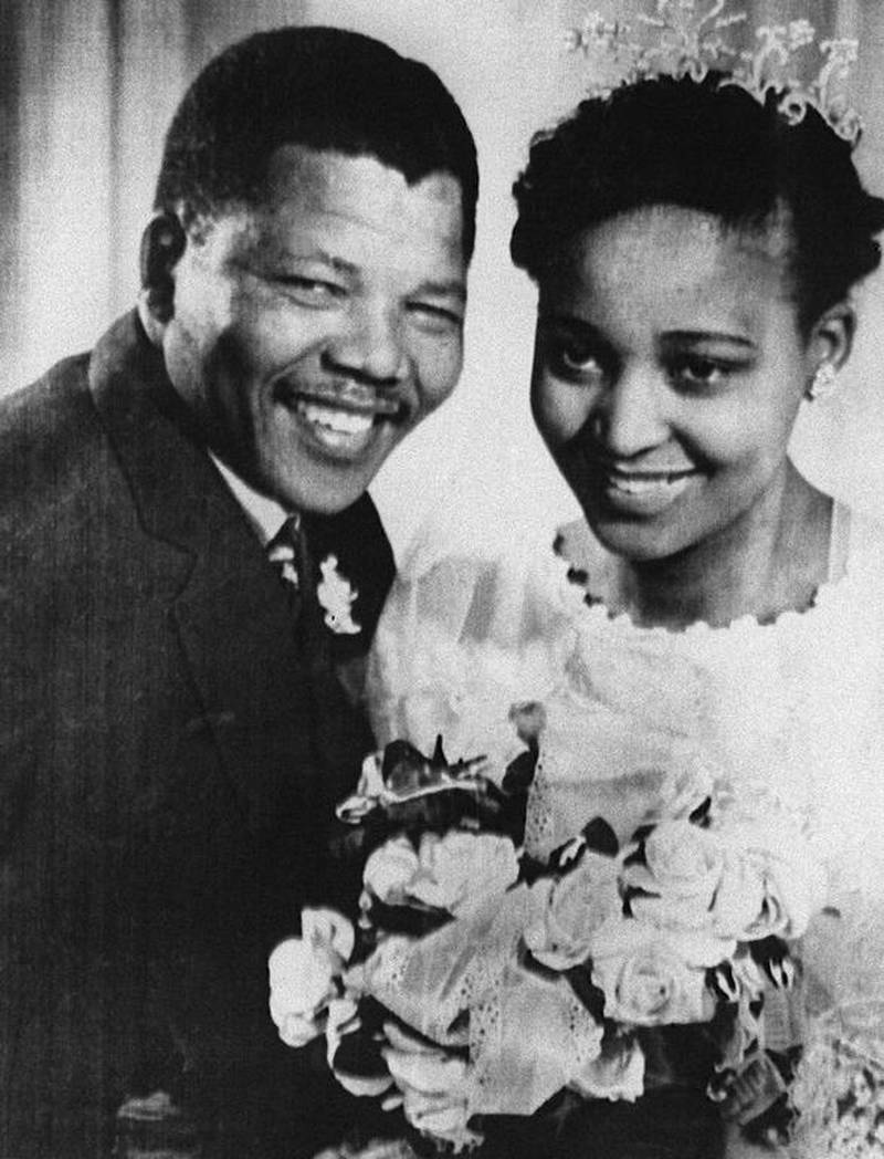 1957: South African anti-apartheid leader and African National Congress (ANC) member Nelson Mandela posing with his wife Winnie during their wedding. AFP PHOTO