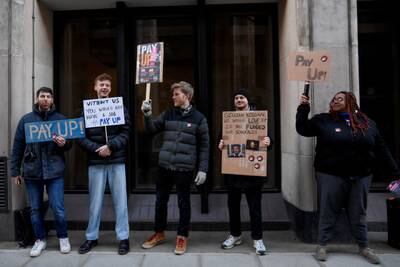 Teachers strike outside a Harris Academy school in London. Reuters